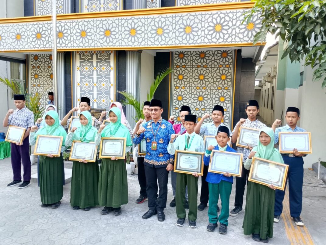 Siswa MTsN 4 Jombang, Bara Sayid Akbar, Sukses Sabet Juara 1 OMI Olimpiade IPS Tingkat Kabupaten 2026 2 a603e22d 0ead 4115 a508 371acfcc0f4a